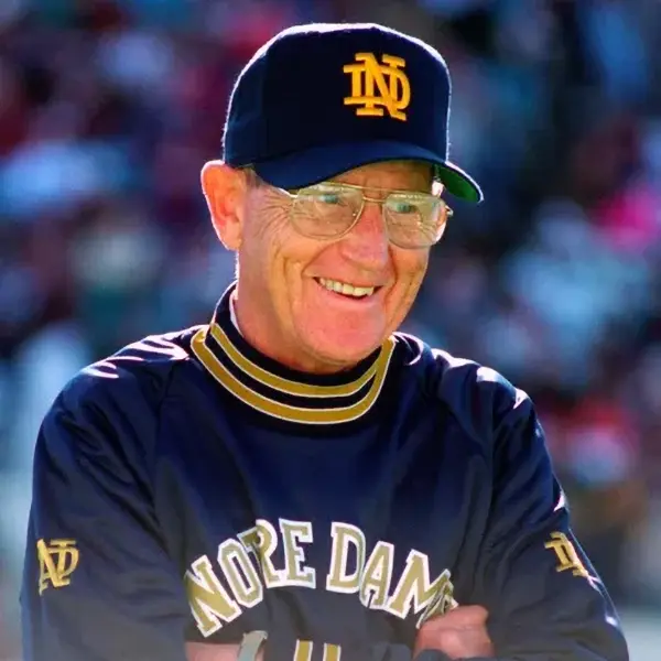 Lou Holtz wearing a Notre Dame pullover