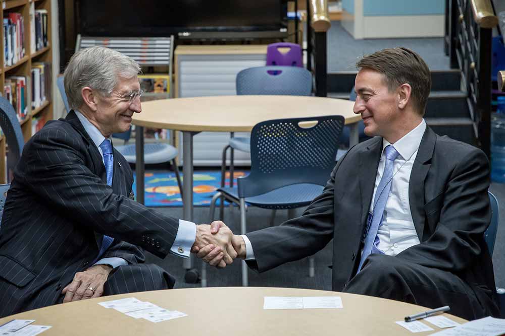 Provost Thomas Burish, meets with U.S. Consul General Jim Mullinax at the consulate in Chengdu, China.