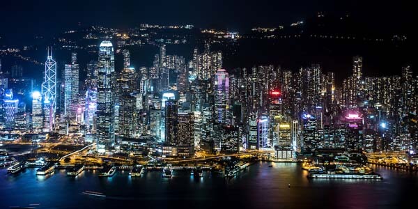 Victoria Harbor and Hong Kong Island at night.