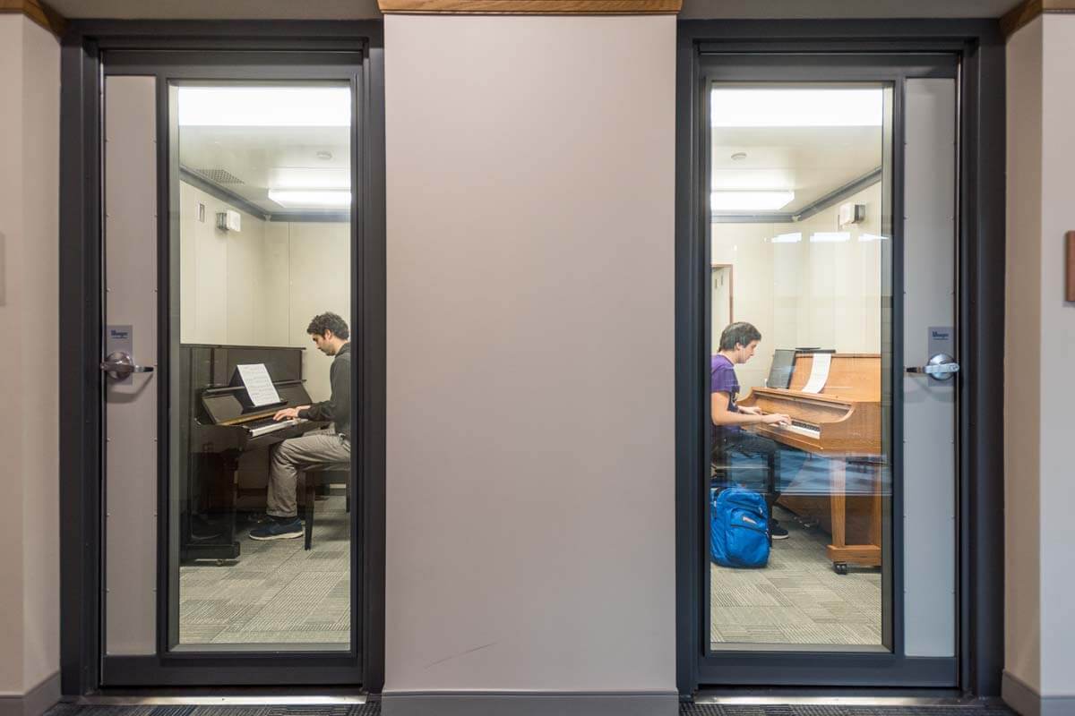 Freshman Jack Sitarski practices next door to Gaston Vilela, a law student from Argentina in sound-proofed practice rooms on the fifth and sixth floors of O'Neill Hall.