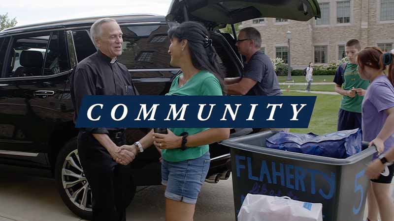 'Notre Dame's president, Fr. John Jenkins, shakes hands with a mother of a first year student. Community' text on top of the image.