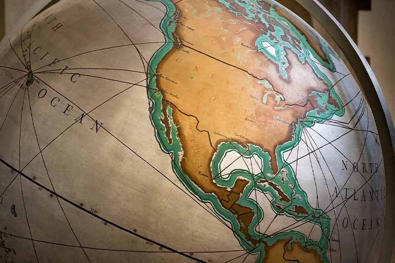 A globe showing the United States, Mexico, and a part of South America.