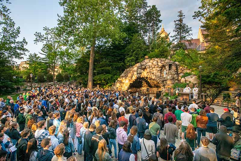 During a clear day, graduates from the class of 2020 gather at the Grotto.