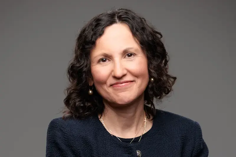 Portrait of Sabine Hadida on a light gray background