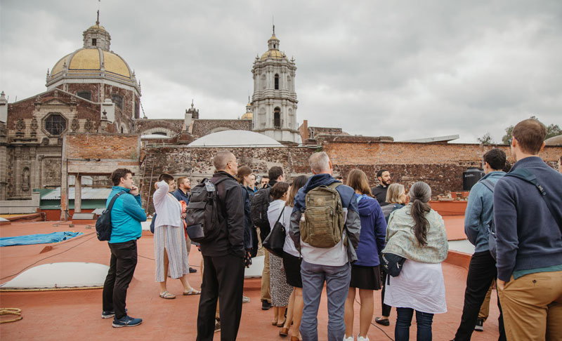 Masters of Divinity students stand in front of the Basilica of Our Lady of Guadalupe