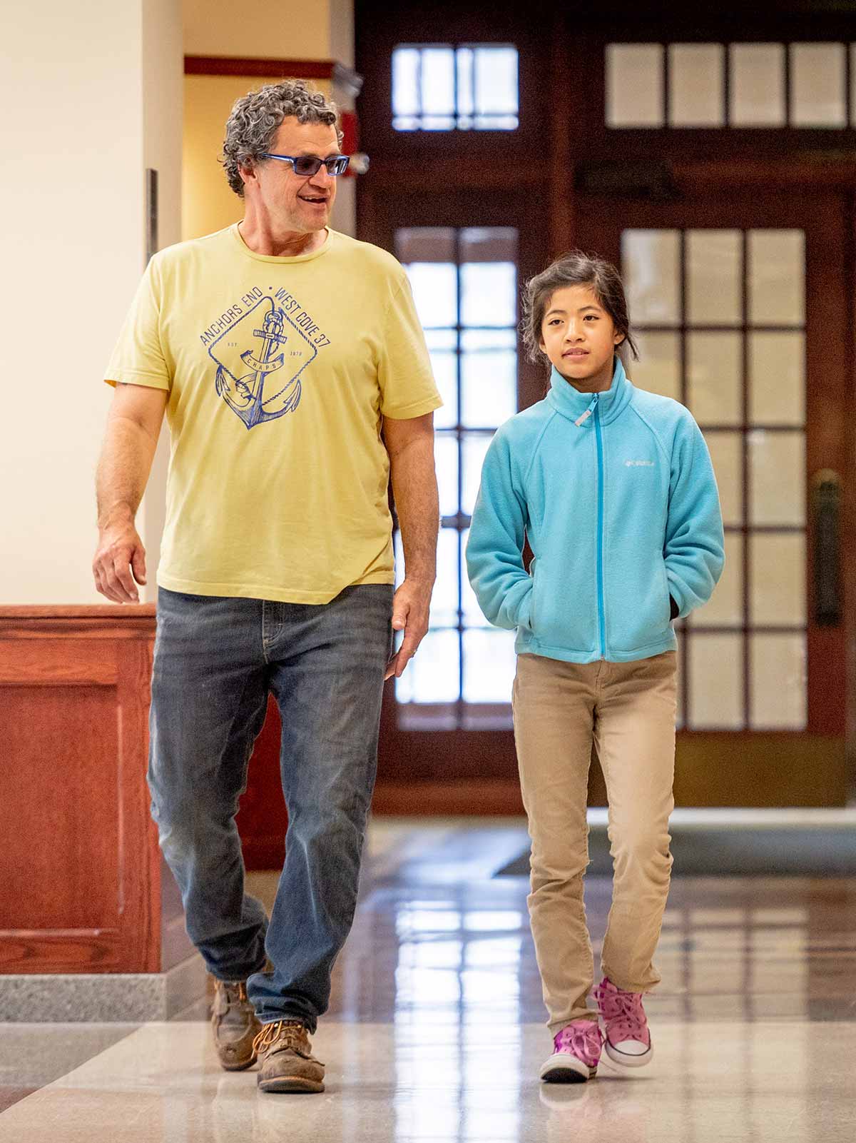 Tori arrives at Stinson Remick Hall with her father for final fitting of a pair of 3D-printed prosthetic hands.