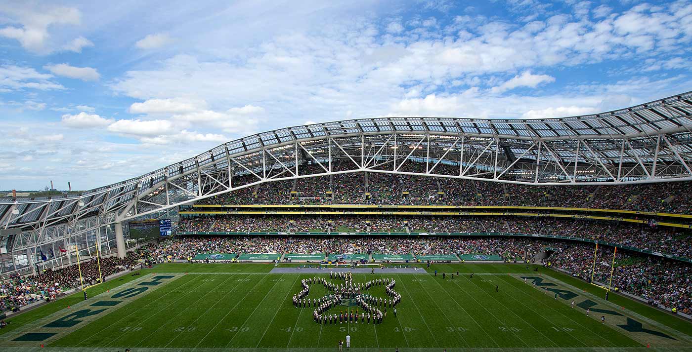 Members of the Notre Dame Marching Band form a cloverleaf during halftime of the 2012 Emerald Isle Classic against Navy at Aviva Stadium in Dublin, Ireland