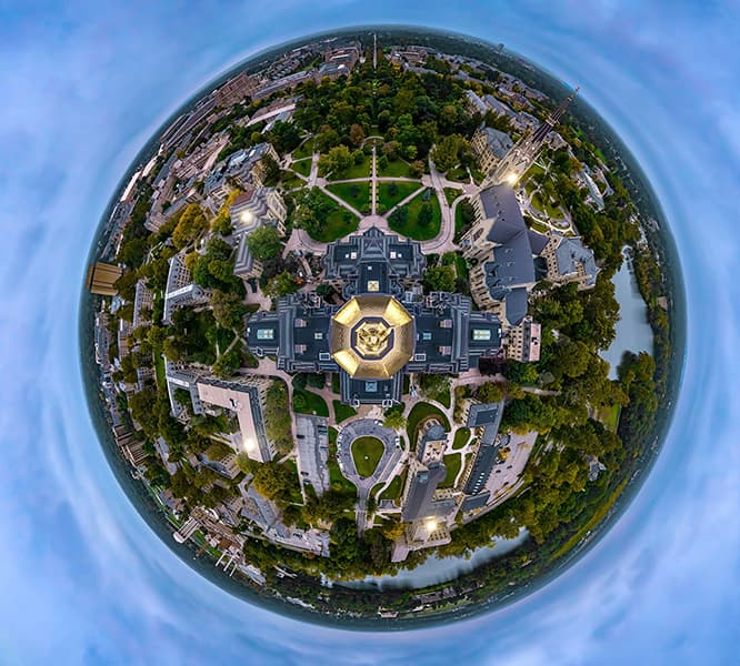 A directly overhead aerial view of the dome with a fisheye lense to make everything look like a planet.