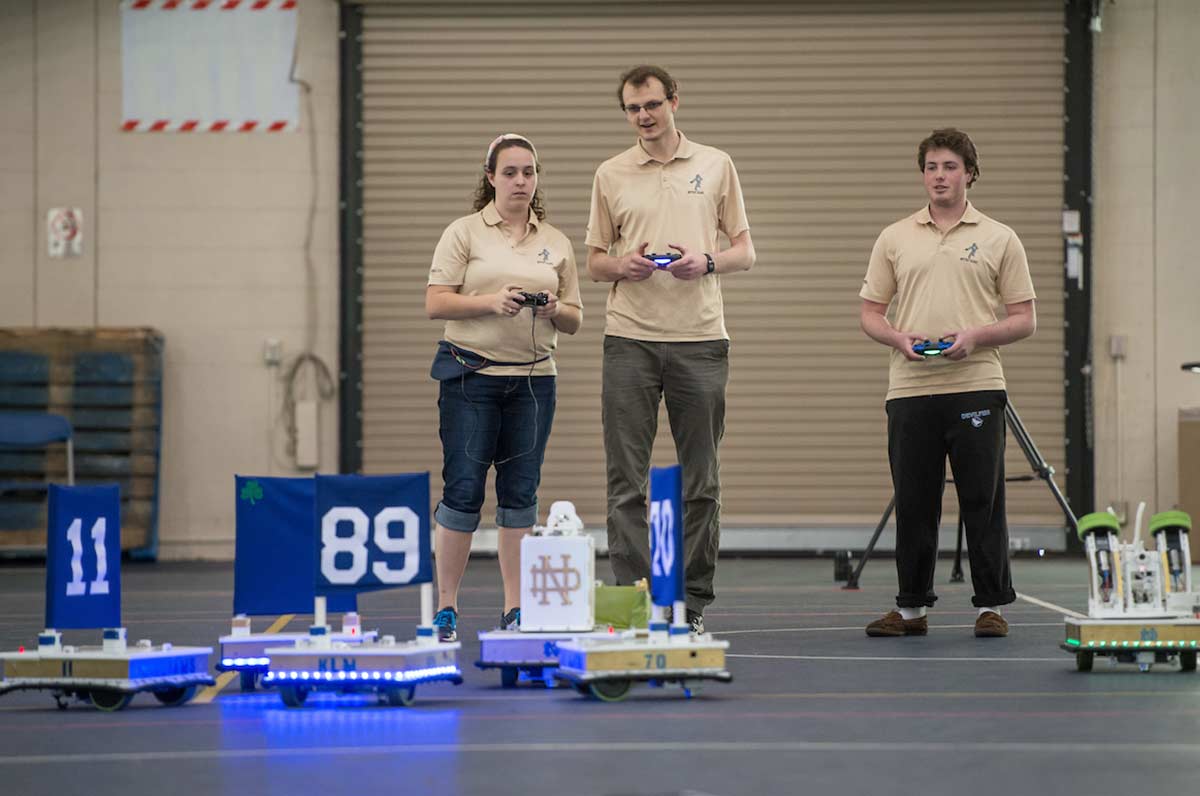 Close up of one robot passing the ball to another.