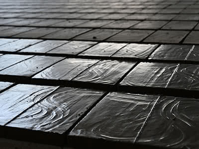 Bricks laid out flat to air dry.