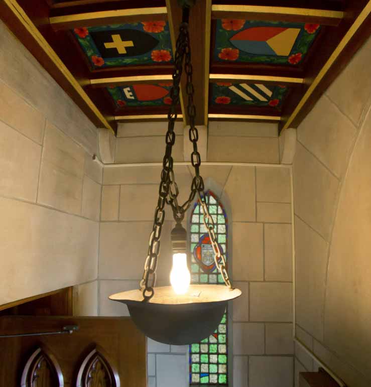 WWI doughboy helmet of former Notre Dame President Rev. Charles O'Donnell, C.S.C. in the vestibule of the east door of the Basilica of the Sacred Heart.