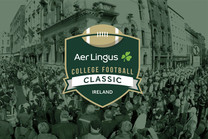 A green shield logo with the words Aer Lingus College Football Classic Ireland in the middle, and a gold football at the top.