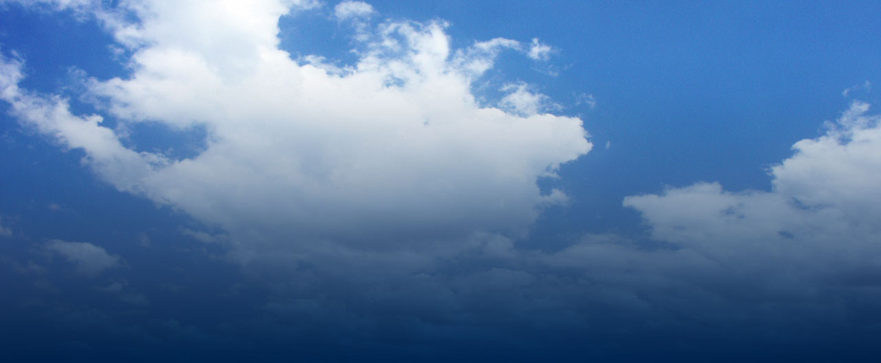 White clouds against a blue sky