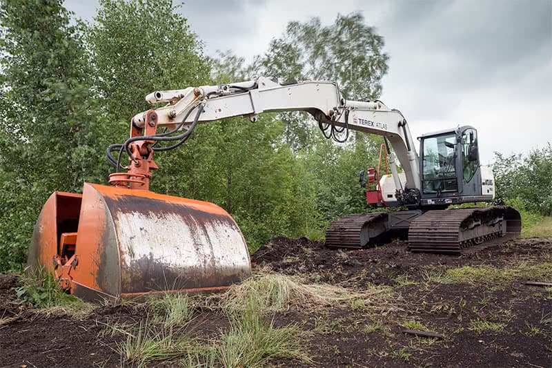 Specialized equipment used to cut large chunks from the bog to further process.