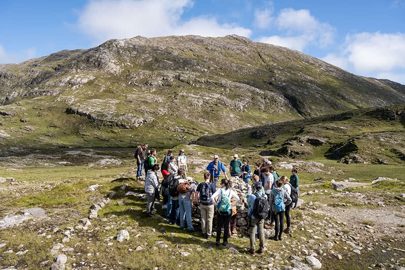 Students hike the remote hills of Máméan.