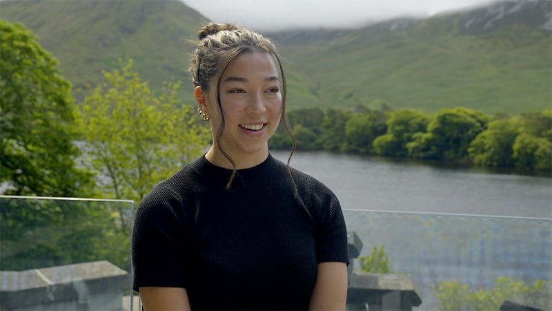 Notre Dame student Grace Beutter smiles while speaking about Notre Dame's Kylemore