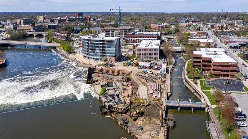A daytime photo of downtown South Bend. Construction along the river.