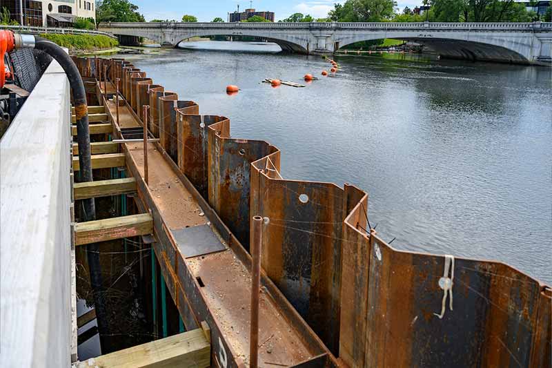 Metal panels along a river.