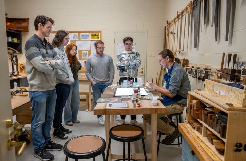 Professor Stephen Hartley demonstrates mixing and painting glass in his Painting with Light class.