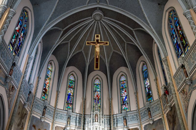 Stained glass windows above the altar at St. Adalbert Catholic Church in South Bend.h.