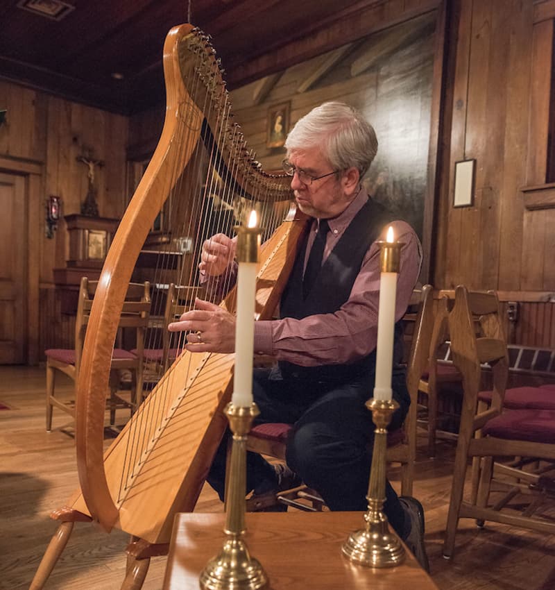 Stephen Warner plays the harp