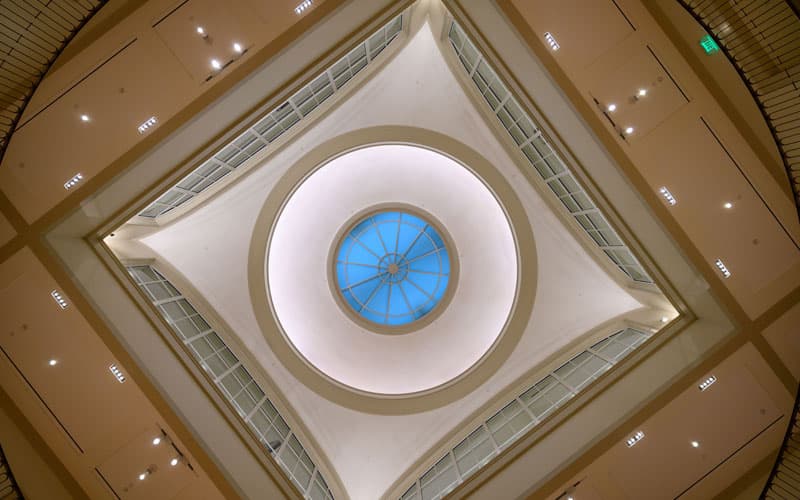 A view of the oculus in the ceiling from the ground.