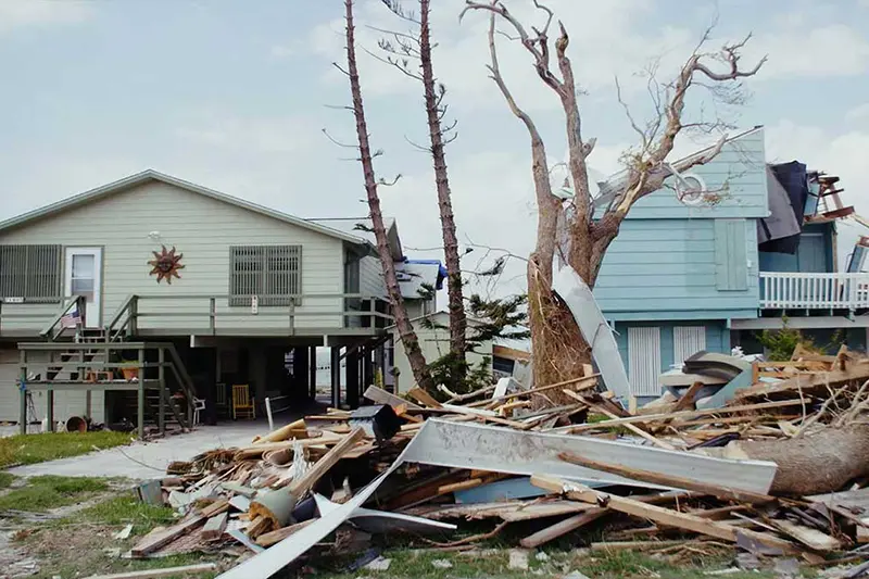 Post storm mess of building materials, broken limbs, metal siding, and other debri from Hurrican Harvey.