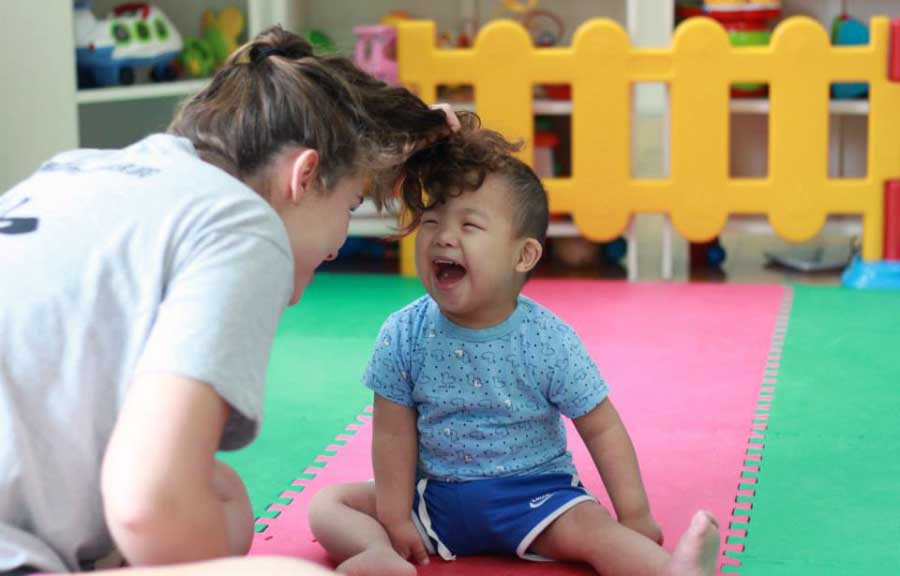 Vincent playing with An, who had recently undergone heart surgery.