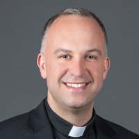 Headshot of Rev. Gerry Olinger