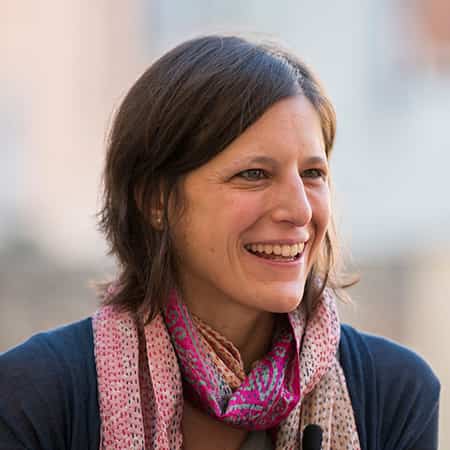 Ilaria Schnyder smiles while speaking.