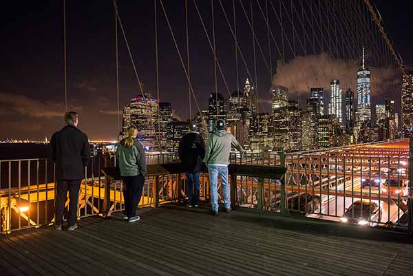Junior engineering students take in the view of Manhattan from the Brooklyn Bridge