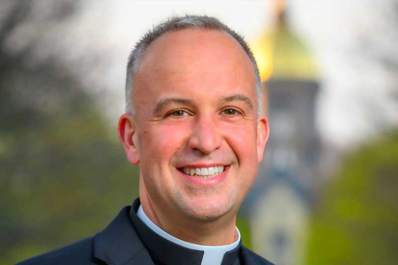 An outdoor headshot of Rev. Gerard J. Olinger, C.S.C.