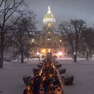 Jan. 18, 2016; Students and staff walk out of the Main Building after a midnight prayer service in honor of the Rev. Martin Luther King Jr. holiday. The service was the inaugural event of a campus-wide Walk the Walk Week observance, during which students, faculty and staff have been asked to reflect on the values central to Martin Luther King Jr.’s legacy and the mission of Notre Dame. (Photo by Matt Cashore/University of Notre Dame)