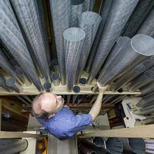 September 23, 2016; Paul Fritts cuts Pedal Trompet 8’ reed resonators to their final length. (Photo by Barbara Johnston/University of Notre Dame)
