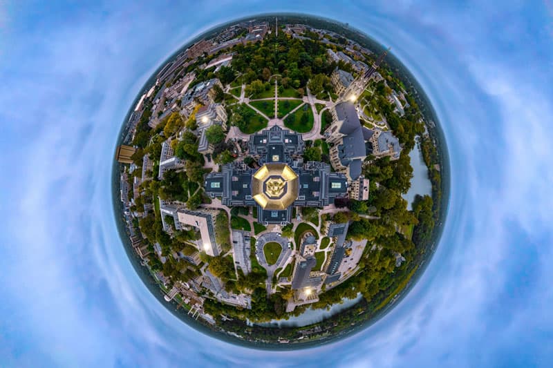 A directly overhead aerial view of the dome with a fisheye lense to make everything look like a planet.