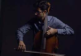 Alex Mansour playing cello