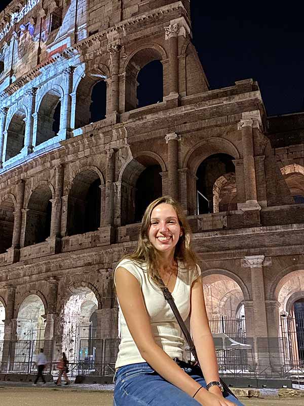 Nicole poses at the Colosseum during the evening.