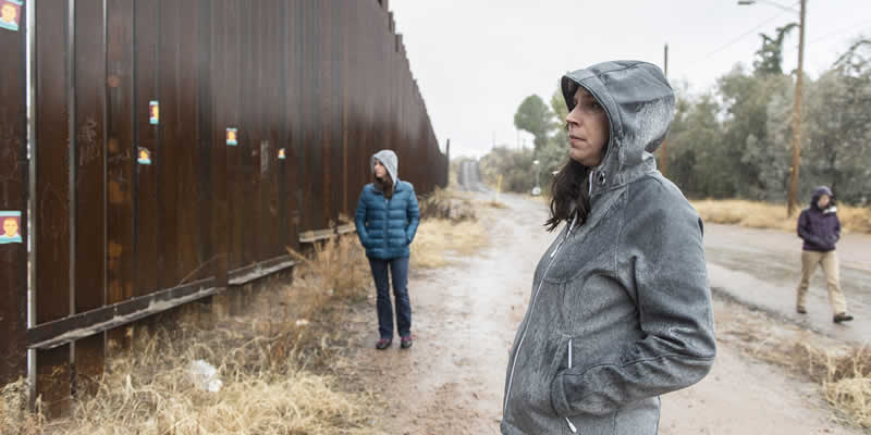 Woman looking at wall