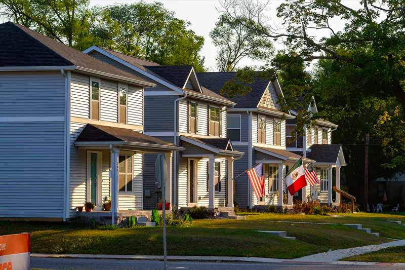 Four houses in a neighboorhood.