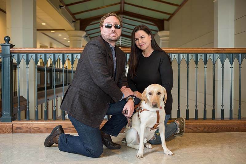 Engel with his wife Marvelyne and Seeing Eye dog Elliott.