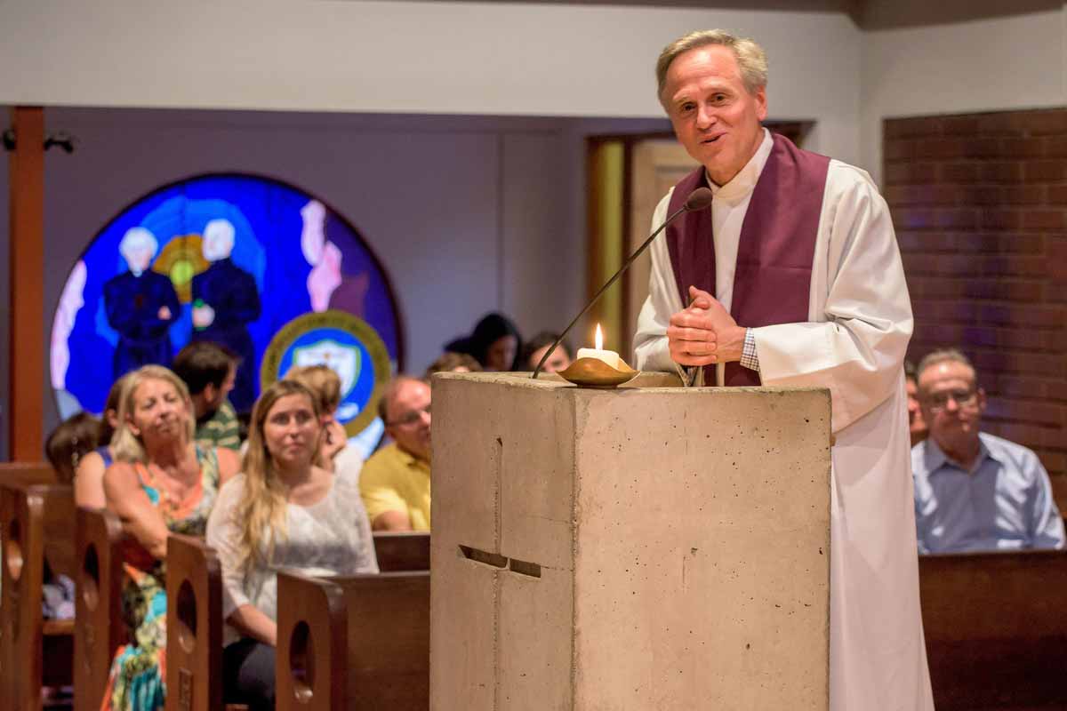 University President Rev. John I. Jenkins, C.S.C. addresses the congregation at St. George’s College in Santiago, Chile that included the school’s parents and their children, Notre Dame students and alumni of both Notre Dame and St. George’s.