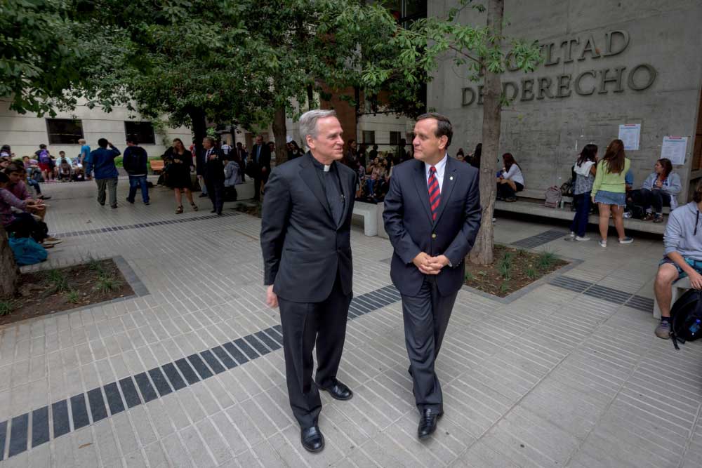 University of Notre Dame President Rev. John I. Jenkins, C.S.C. meets with Dr. Ignacio Sanchez, President of Pontificia Universidad Catolica de Chile on the Casa Central Campus in Santiago, Chile. Notre Dame and PUC leaders held a number of meetings about current collaboration and future cooperation on everything from student and faculty exchanges to combined research.