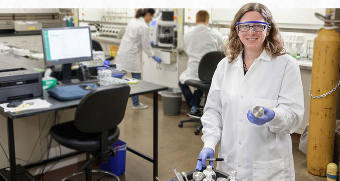 Melissa Berke in a white lab coat