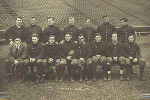 The 1909 Notre Dame football team pose in Notre Dame Stadium.
