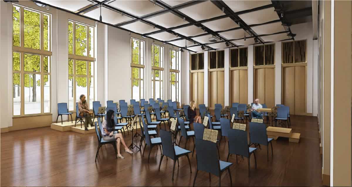 An interior rendering of a recital hall in the music program building.