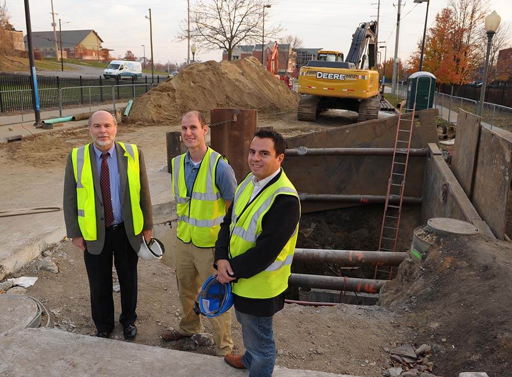Gary Gilot, left, Tim Ruggaber, and Luis Montestruque at an EmNet site on Niles Avenue in South Bend.