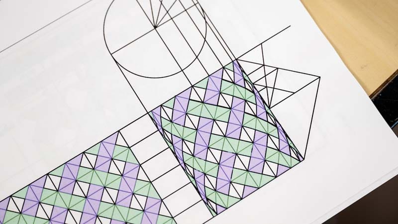 Purple and green lattice coloring to create depth.