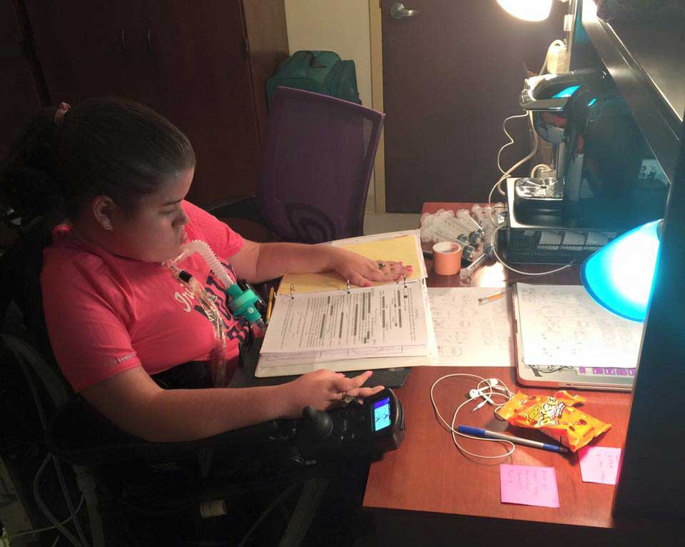 Megan Crowley studying at her desk.