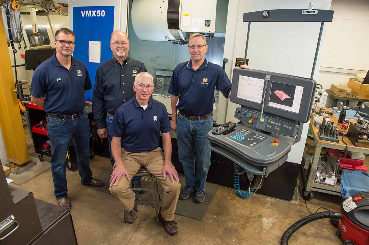 Mike Sanders, Leon Hluchota, Eugene Heyse and Terry Jacobsen in Hessert Lab.