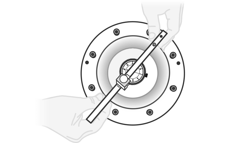 Hands hold a gauge used to measure a cross-section of the nozzle.